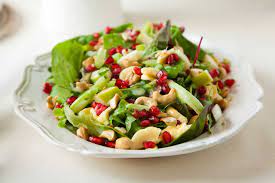 BABY LEEF, LETTUCE, APPLES, POMEGRANATE, ROASTED WALNUTS AND VINIGRET-8 DINERS